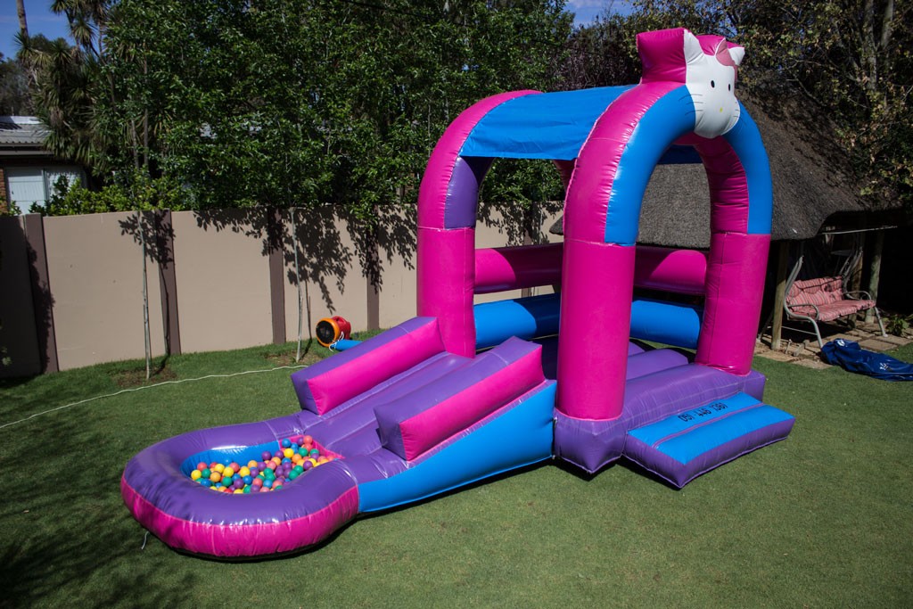 Hello-Kitty-Jumping-Castle,-Roof-Slide--Pond